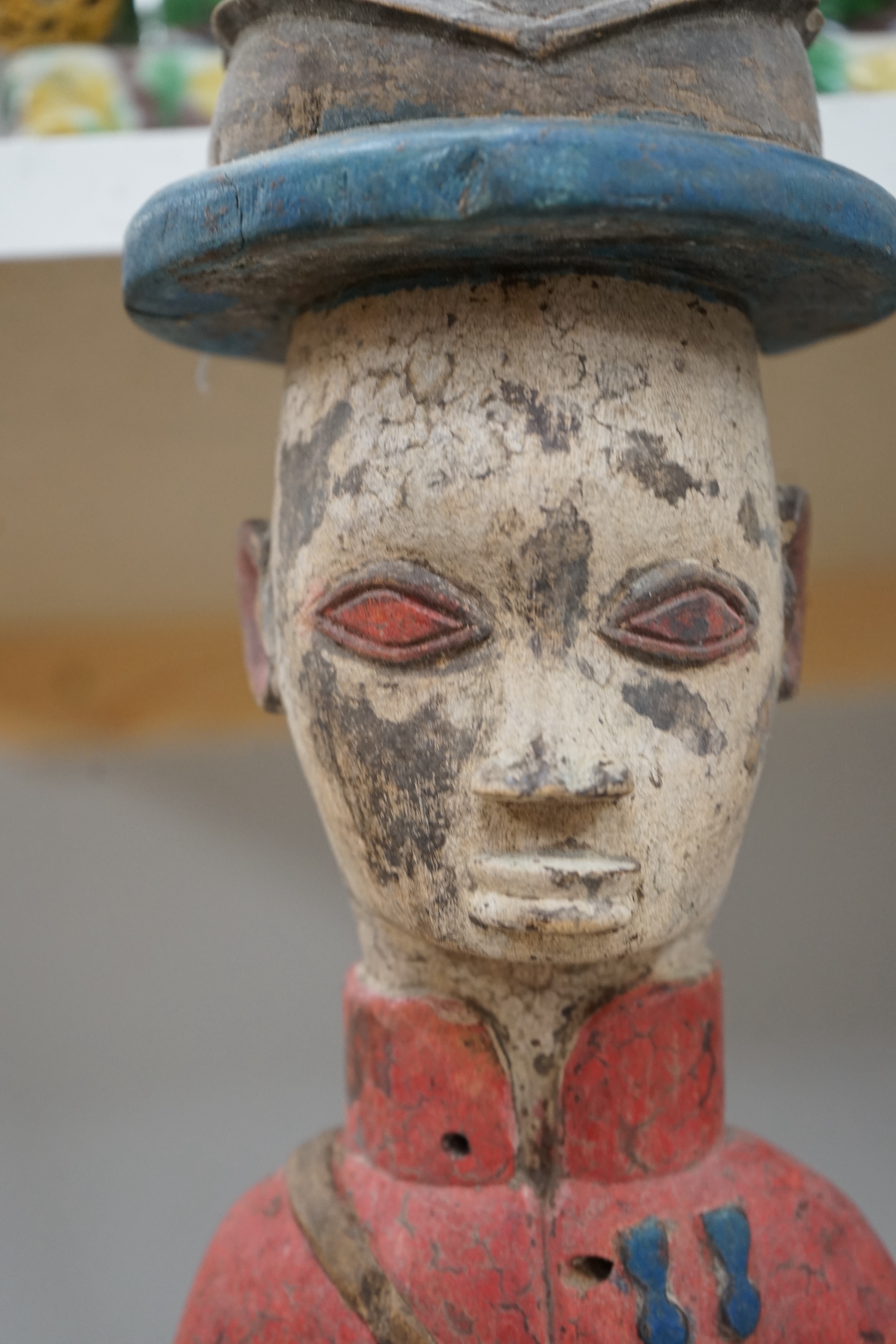 A 20th century West African carving of a colonial military figure and another similar, largest 48cm high. Condition - largest figure chipped